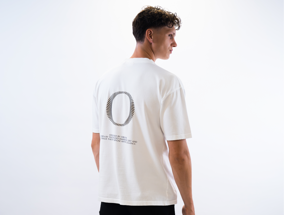 Person wearing The Origin. Slash Tee White  against a white background.