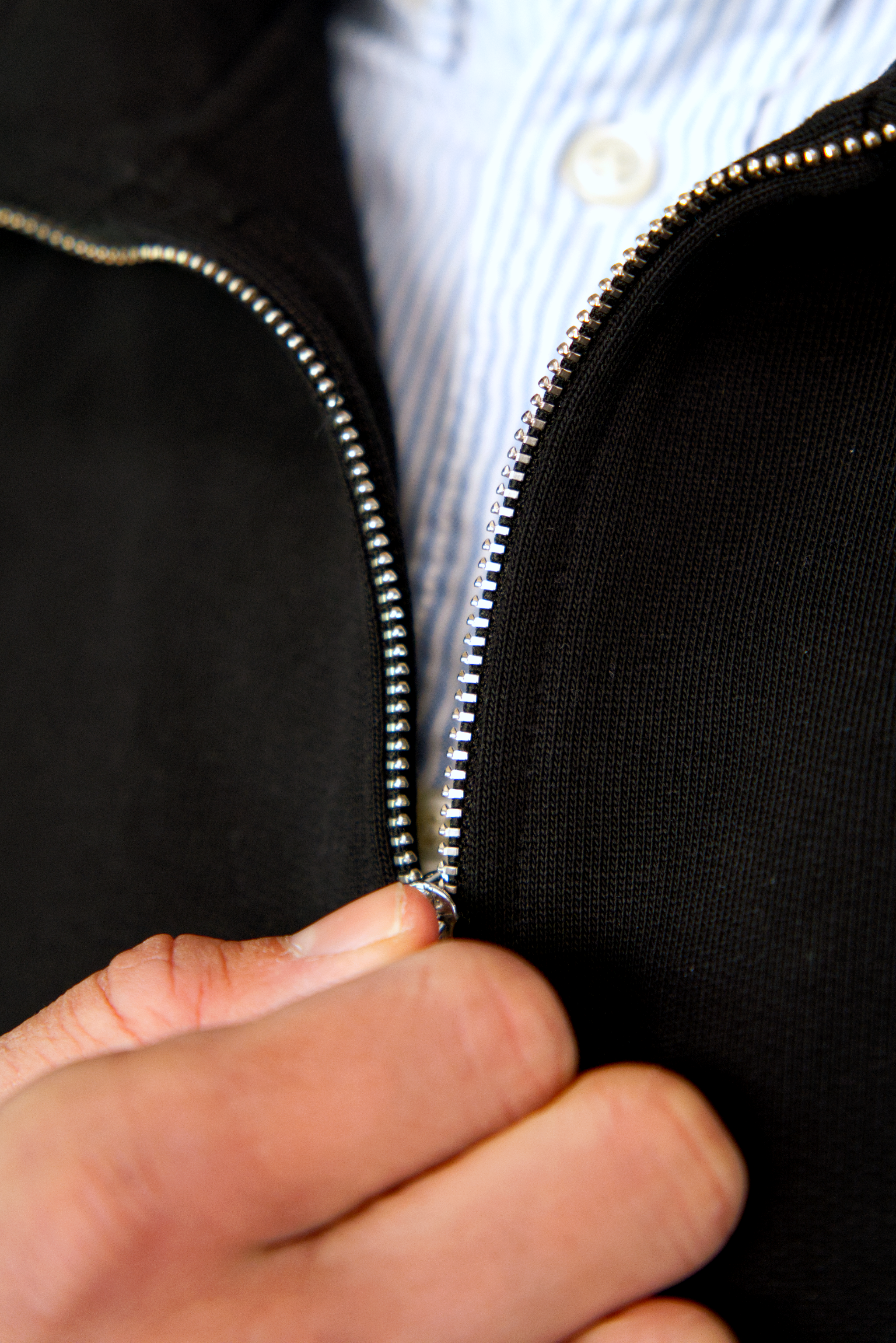 Zip detail Alloy Half Zip Origin. in black, featuring YKK Zip and organic cotton fabric.